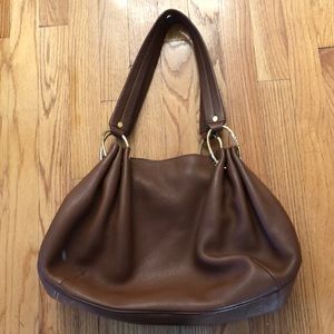 Great buy! Juicy Couture saddle leather hobo